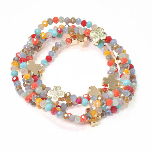 Cross accent multi layered beaded stretch bracelet