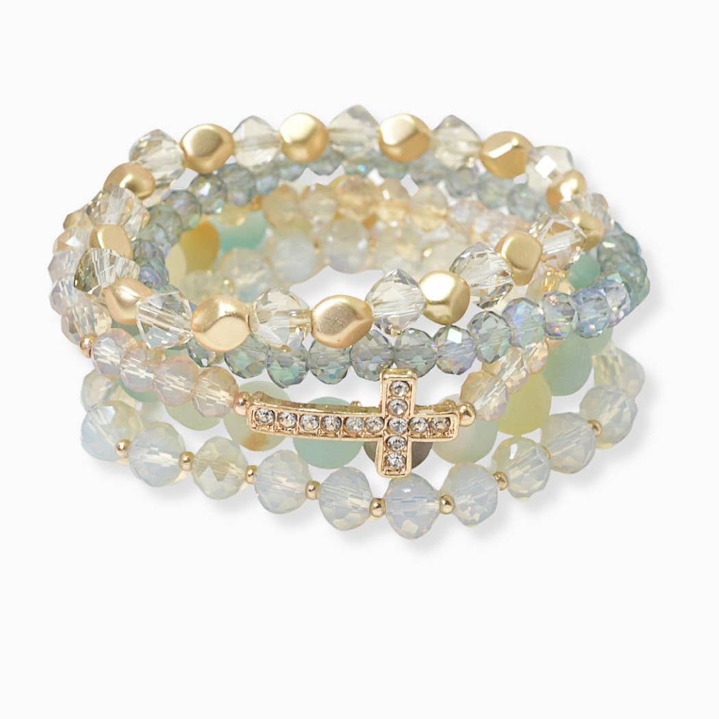 Pave cross accent multi layered beaded stretch bracelet