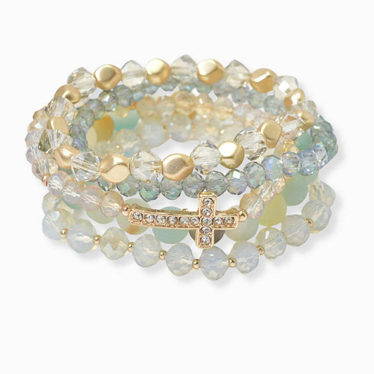 Pave cross accent multi layered beaded stretch bracelet