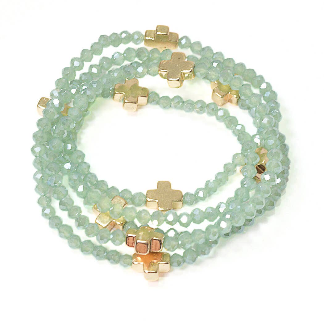 Cross accent multi layered beaded stretch bracelet