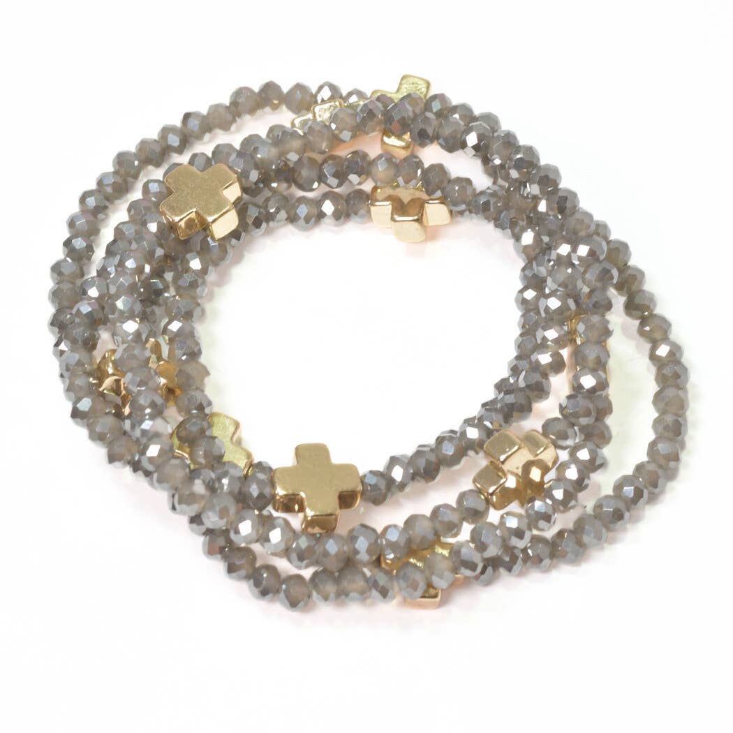 Cross accent multi layered beaded stretch bracelet