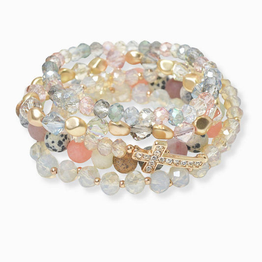 Pave cross accent multi layered beaded stretch bracelet